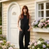 WhatsApp Image 2026-04-26 at 5.34.01 PM black sleeveless button-front jumpsuit