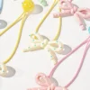 17683671382151813fb0b1a64660131021195d8ca7 4pcs Girls' Cute Versatile Cream Polka Dot Bow Elastic Hair Ties