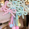1768367139894b9e666d337bf97f656a9a65e6cf55 4pcs Girls' Cute Versatile Cream Polka Dot Bow Elastic Hair Ties