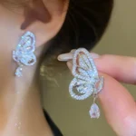 1lrxaap6bywxuu97lgz27w08h (1) Butterfly & Teardrop Shape Dangle Earrings